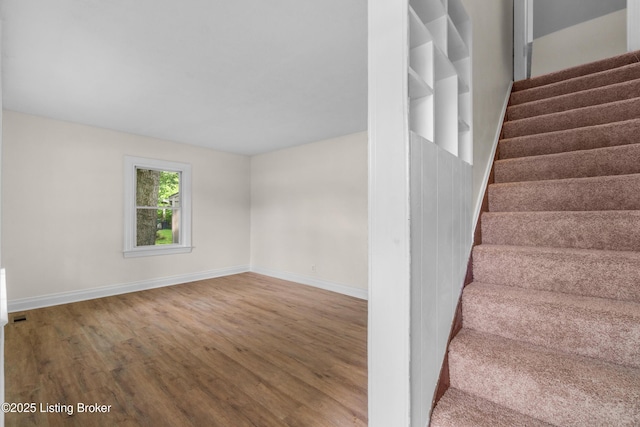 4725 Kiefer Rd, Louisville, KY 40216 - staircase featuring wood finished floors and baseboards