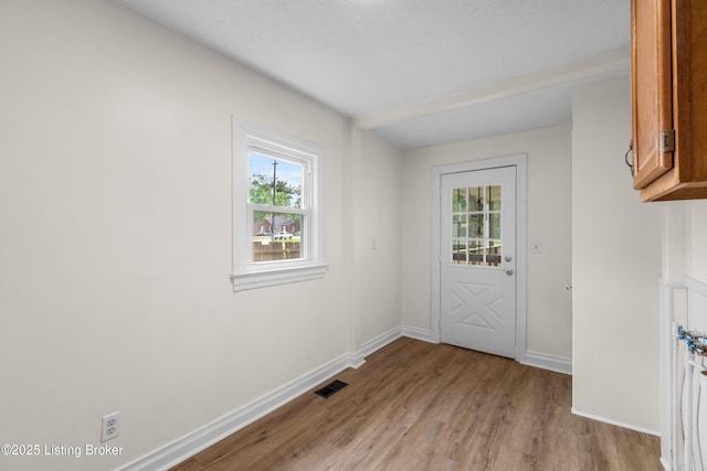 4725 Kiefer Rd, Louisville, KY 40216 - doorway to outside with light wood finished floors and baseboards