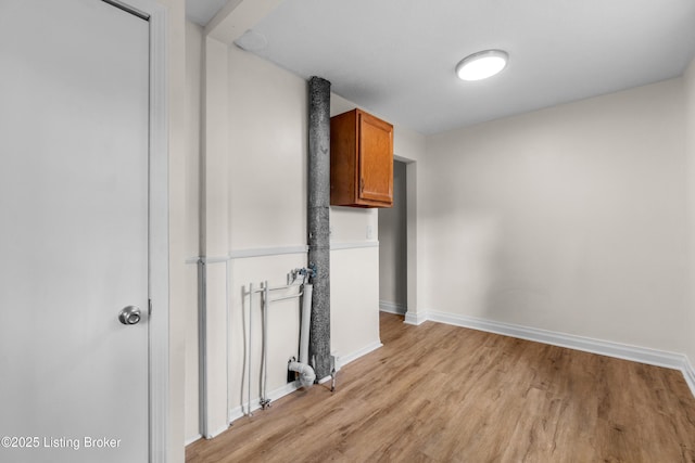 4725 Kiefer Rd, Louisville, KY 40216 - washroom with light wood finished floors and baseboards