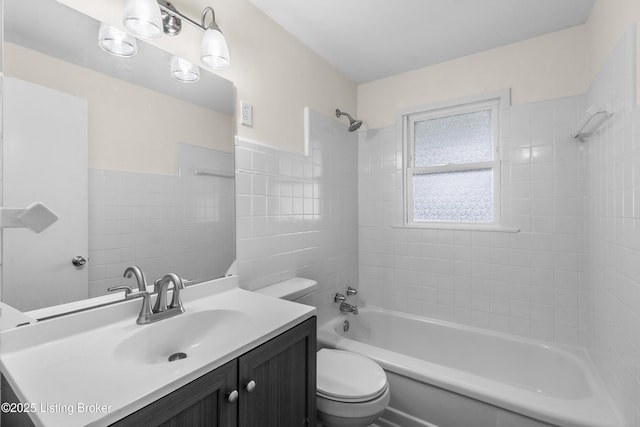 4725 Kiefer Rd, Louisville, KY 40216 - full bath with toilet, vanity, tub / shower combination, and tile walls