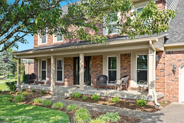 6400 Cedar Branch Ct, Louisville, KY 40291 - view of front of house with a porch, brick siding, and a shingled roof