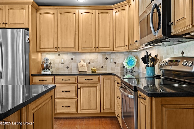 6400 Cedar Branch Ct, Louisville, KY 40291 - kitchen with stainless steel appliances, light wood-type flooring, dark stone counters, and decorative backsplash