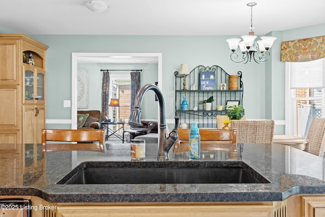 6400 Cedar Branch Ct, Louisville, KY 40291 - kitchen with light brown cabinets, a chandelier, and dark stone counters