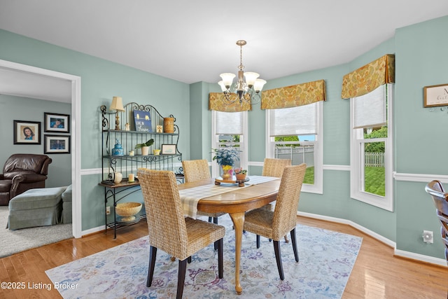 6400 Cedar Branch Ct, Louisville, KY 40291 - dining space with a chandelier and wood finished floors
