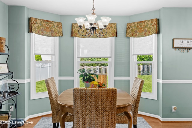 6400 Cedar Branch Ct, Louisville, KY 40291 - dining space featuring a chandelier and wood finished floors