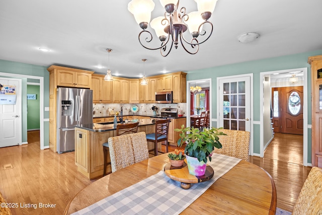 6400 Cedar Branch Ct, Louisville, KY 40291 - dining space with a chandelier and light wood-style floors