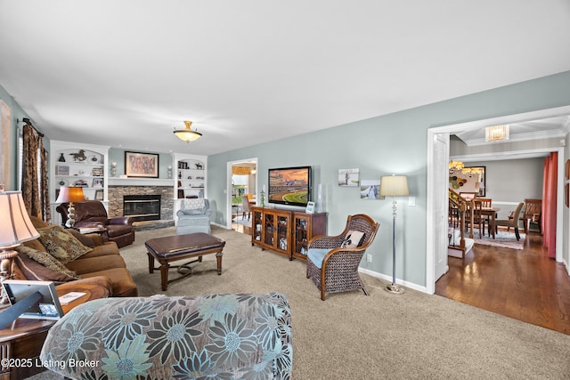 6400 Cedar Branch Ct, Louisville, KY 40291 - living area with carpet flooring, a fireplace, ornamental molding, and built in shelves