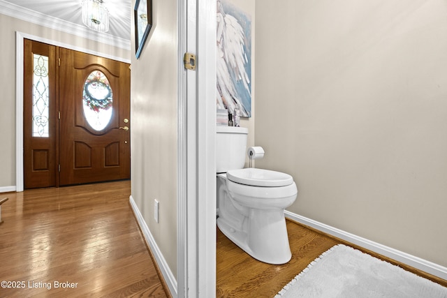 6400 Cedar Branch Ct, Louisville, KY 40291 - entryway with wood finished floors and crown molding