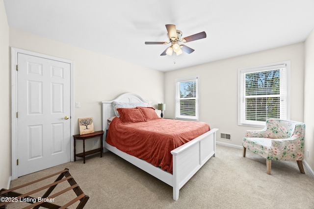 6400 Cedar Branch Ct, Louisville, KY 40291 - carpeted bedroom with multiple windows and ceiling fan