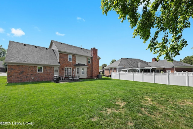 6400 Cedar Branch Ct, Louisville, KY 40291 - back of house with brick siding, a patio area, and a shingled roof