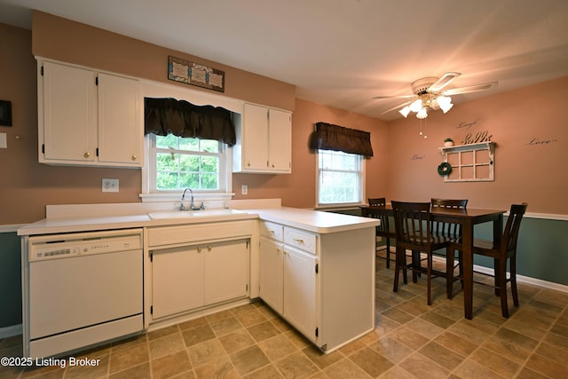 4913 D Lue Ct, Louisville, KY 40216 - kitchen featuring white dishwasher, a sink, a peninsula, a ceiling fan, and white cabinets