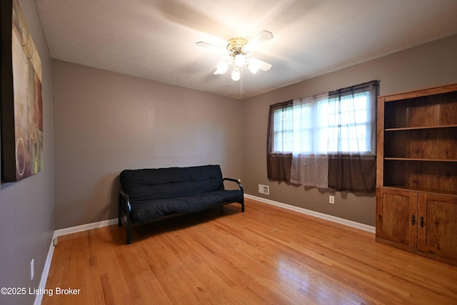 4913 D Lue Ct, Louisville, KY 40216 - living area featuring a ceiling fan, light wood-style flooring, and baseboards