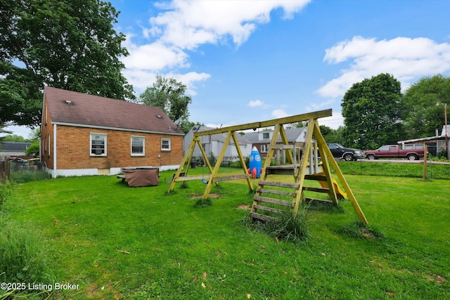 315 N 27th St, Louisville, KY 40212 - view of play area with a yard