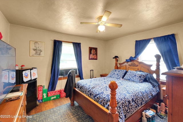 315 N 27th St, Louisville, KY 40212 - bedroom with wood-type flooring and a ceiling fan