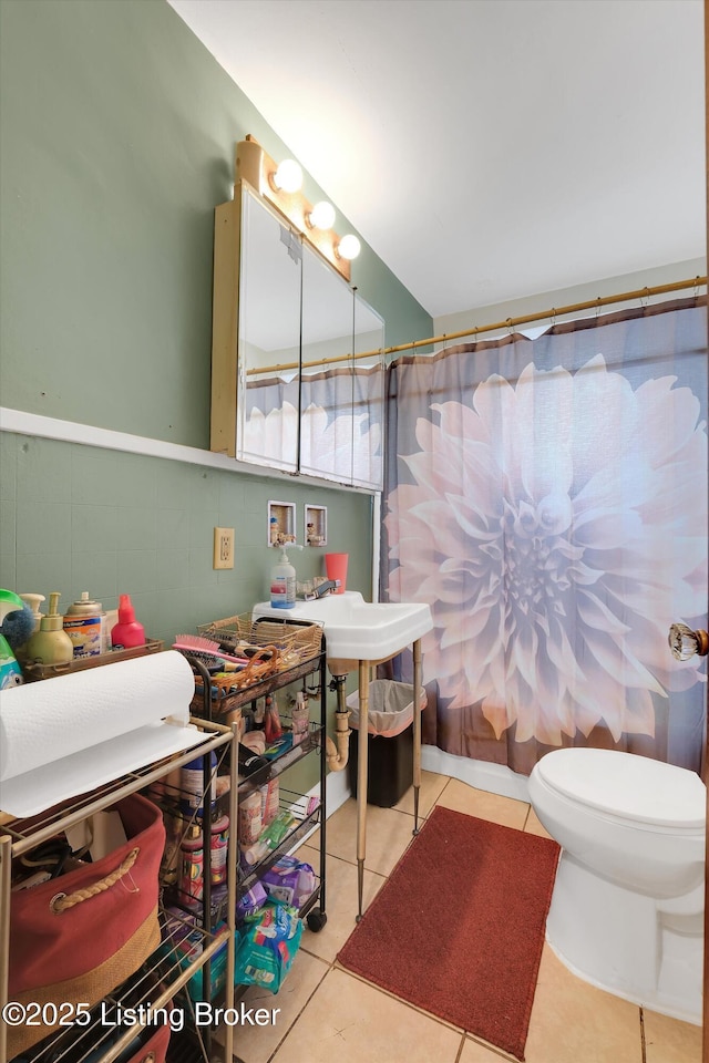 315 N 27th St, Louisville, KY 40212 - bathroom with toilet and tile patterned floors