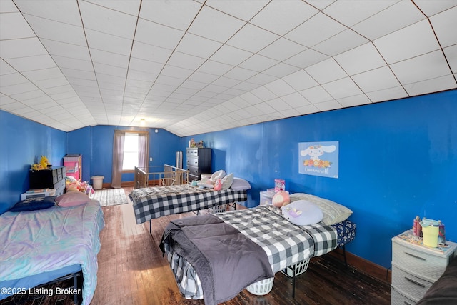 315 N 27th St, Louisville, KY 40212 - bedroom with wood-type flooring, lofted ceiling, and baseboards