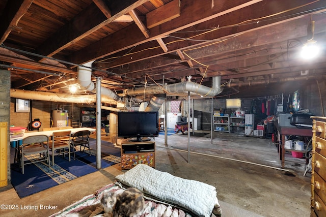 315 N 27th St, Louisville, KY 40212 - unfinished basement with water heater and washer / clothes dryer