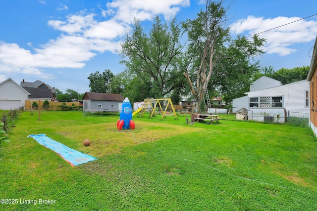 315 N 27th St, Louisville, KY 40212 - view of yard with a playground and central air condition unit