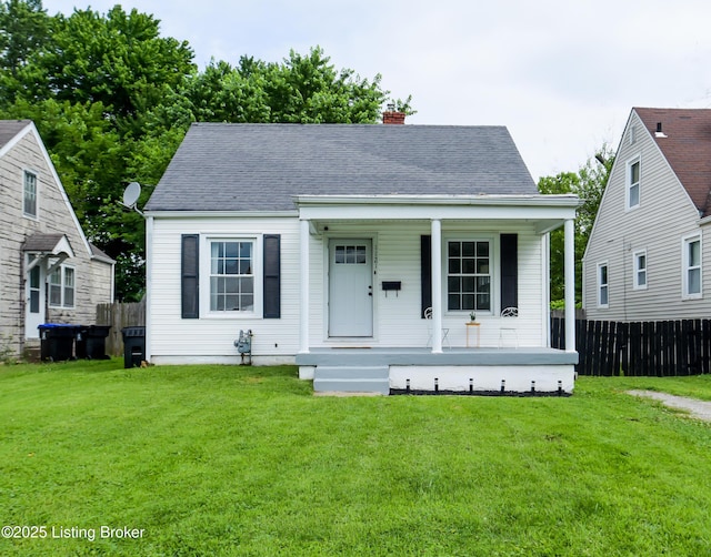 1121 Walter Ave, Louisville, KY 40215 - bungalow with covered porch, a chimney, and roof with shingles