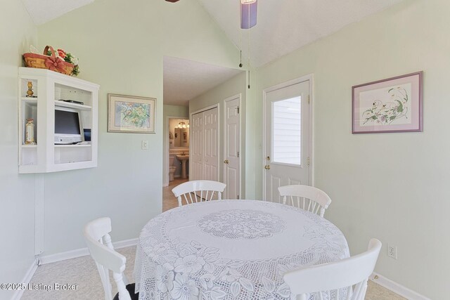 348 Old Stone Dr, Simpsonville, KY 40067 - dining area featuring vaulted ceiling, ceiling fan, carpet, and baseboards