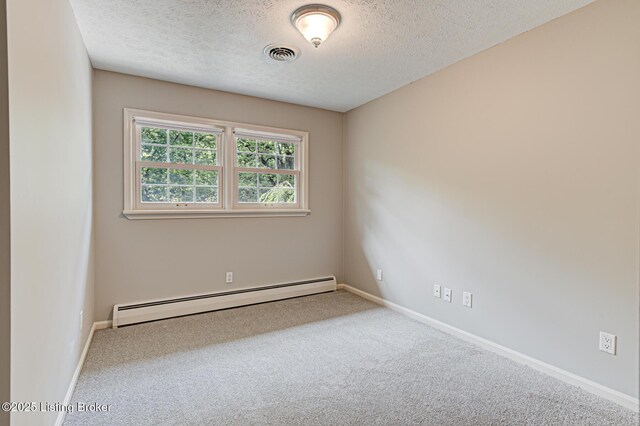 3325 Chenoweth Run Rd, Louisville, KY 40299 - spare room with a baseboard heating unit, a textured ceiling, carpet, and baseboards