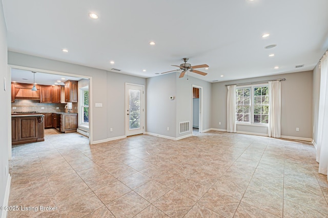 3325 Chenoweth Run Rd, Louisville, KY 40299 - unfurnished living room with healthy amount of natural light, recessed lighting, a ceiling fan, light tile patterned flooring, and baseboards
