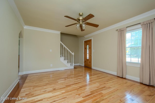 1115 Springview Dr, Louisville, KY 40219 - entrance foyer featuring light wood finished floors, ornamental molding, stairway, and a ceiling fan