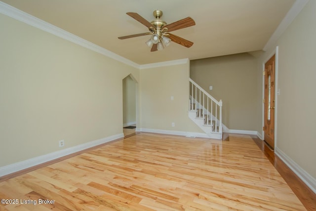 1115 Springview Dr, Louisville, KY 40219 - unfurnished room with wood finished floors, stairs, a ceiling fan, and crown molding