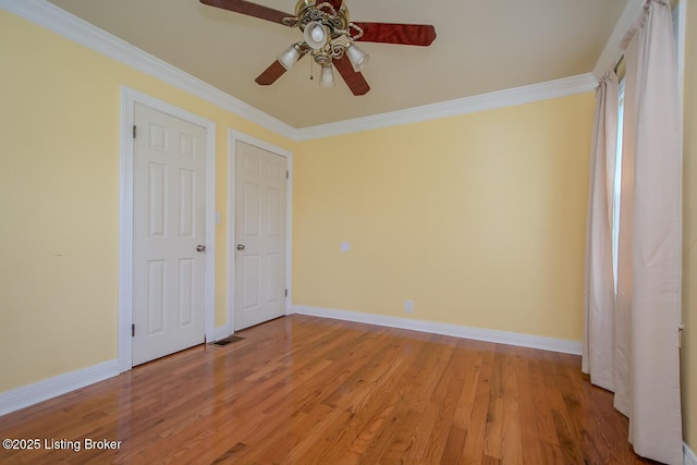 1115 Springview Dr, Louisville, KY 40219 - unfurnished bedroom featuring light wood-style flooring, crown molding, and ceiling fan
