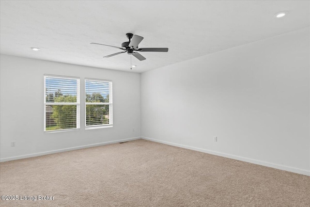 11210 Remembrance Ln, Louisville, KY 40229 - unfurnished room featuring ceiling fan, light colored carpet, and recessed lighting