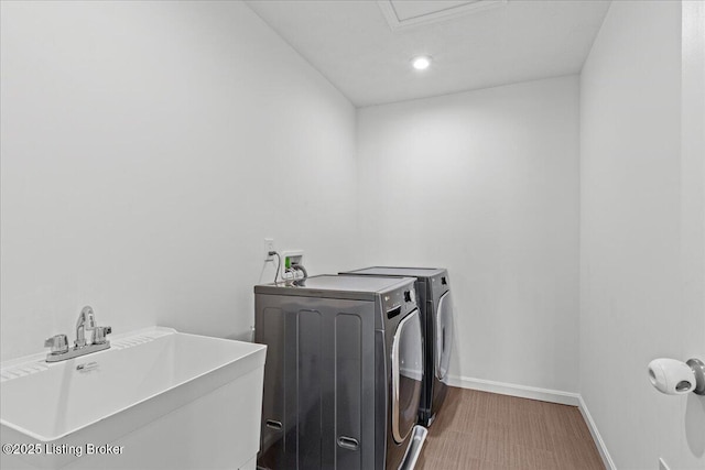 11210 Remembrance Ln, Louisville, KY 40229 - laundry room with independent washer and dryer and recessed lighting