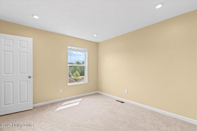 11210 Remembrance Ln, Louisville, KY 40229 - unfurnished room with carpet and recessed lighting