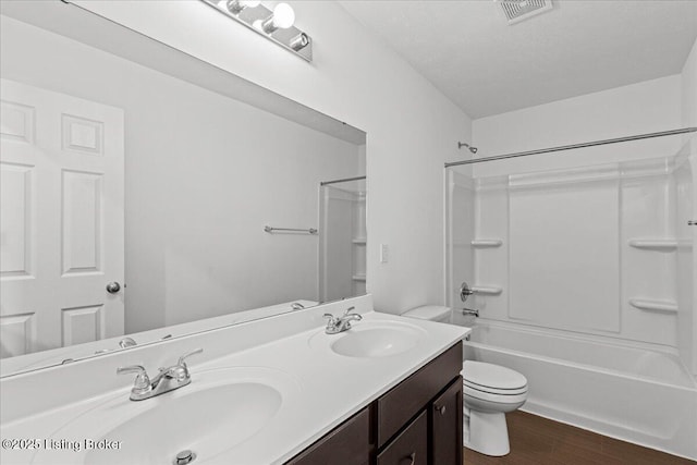 11210 Remembrance Ln, Louisville, KY 40229 - full bath featuring double vanity, shower / washtub combination, and wood finished floors