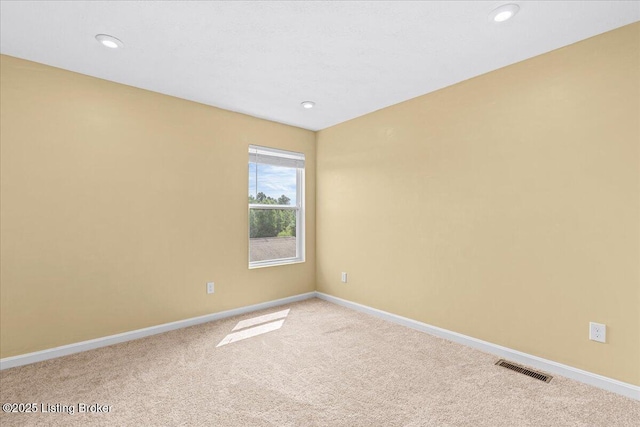 11210 Remembrance Ln, Louisville, KY 40229 - unfurnished room featuring light colored carpet and recessed lighting