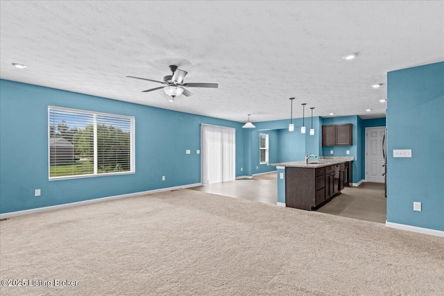 11210 Remembrance Ln, Louisville, KY 40229 - unfurnished living room featuring light colored carpet, ceiling fan, and recessed lighting