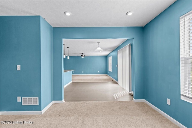 11210 Remembrance Ln, Louisville, KY 40229 - carpeted spare room with plenty of natural light and ceiling fan