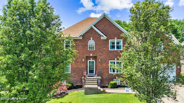 17411 Polo Run Ln, Louisville, KY 40245 - back of house with brick siding and a lawn