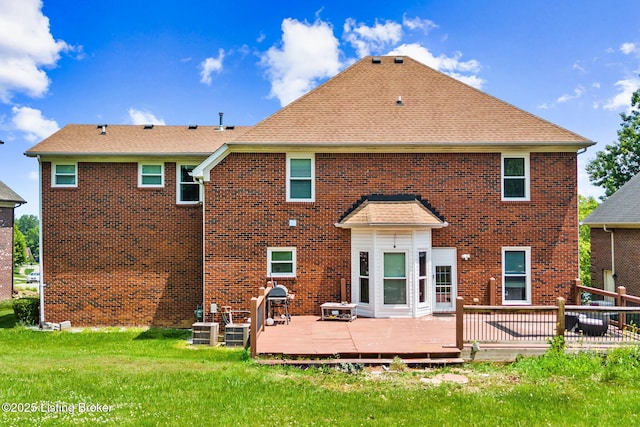 17411 Polo Run Ln, Louisville, KY 40245 - back of house with a yard, a wooden deck, brick siding, and central AC unit