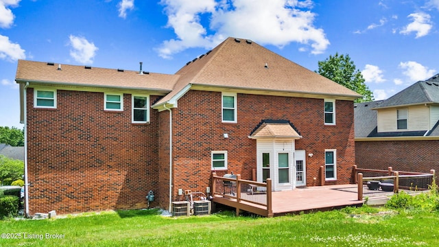 17411 Polo Run Ln, Louisville, KY 40245 - back of house with a wooden deck, brick siding, a yard, and central AC