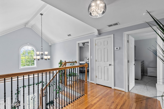 17411 Polo Run Ln, Louisville, KY 40245 - corridor with a chandelier, light wood-style flooring, an upstairs landing, baseboards, and ornamental molding