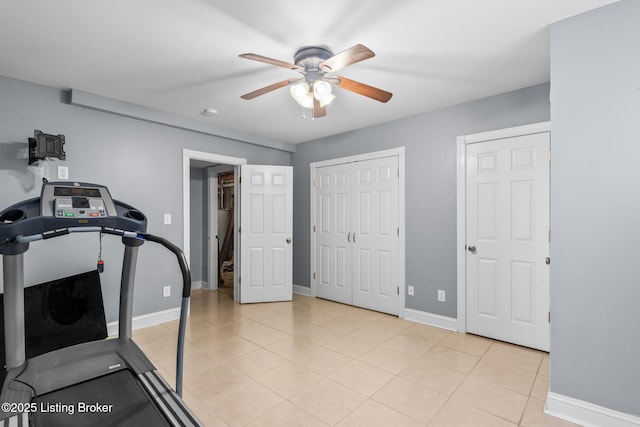17411 Polo Run Ln, Louisville, KY 40245 - workout area featuring a ceiling fan, light tile patterned floors, and baseboards
