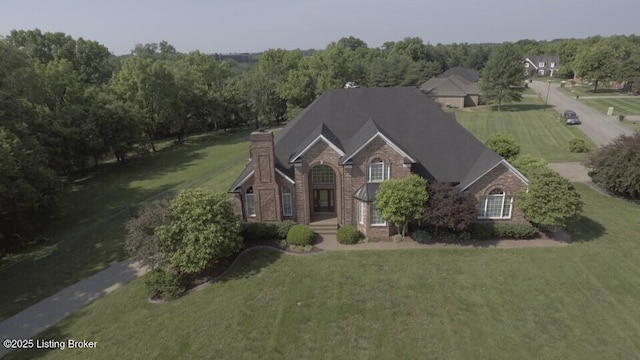 166 Castleton Dr, Bardstown, KY 40004 - traditional home featuring a front lawn, brick siding, and a chimney