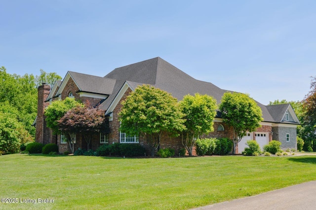 166 Castleton Dr, Bardstown, KY 40004 - view of front of property with a front yard, a garage, and a chimney