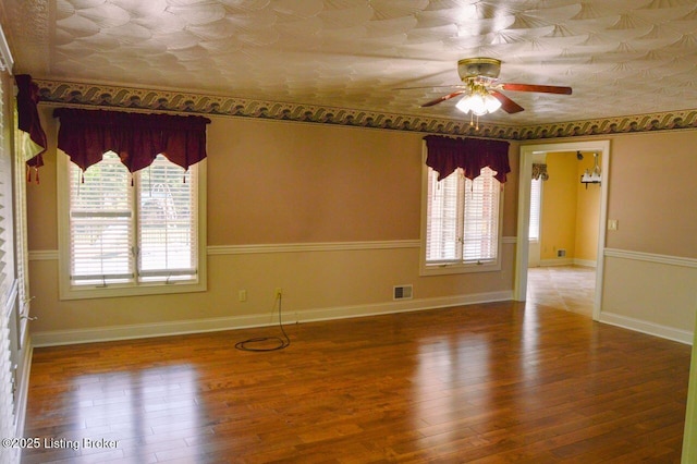 166 Castleton Dr, Bardstown, KY 40004 - spare room featuring plenty of natural light, a ceiling fan, an ornate ceiling, and wood-type flooring