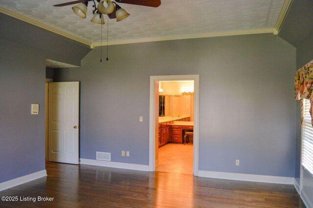 166 Castleton Dr, Bardstown, KY 40004 - unfurnished bedroom featuring crown molding, wood finished floors, lofted ceiling, baseboards, and ensuite bath