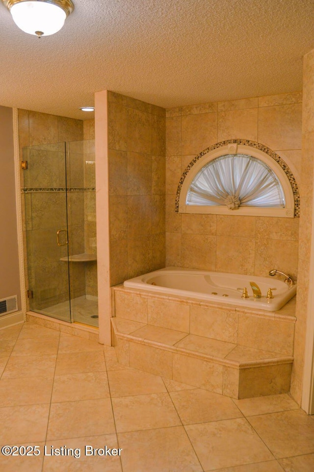 166 Castleton Dr, Bardstown, KY 40004 - full bath featuring a bath, a stall shower, a textured ceiling, and tile patterned floors