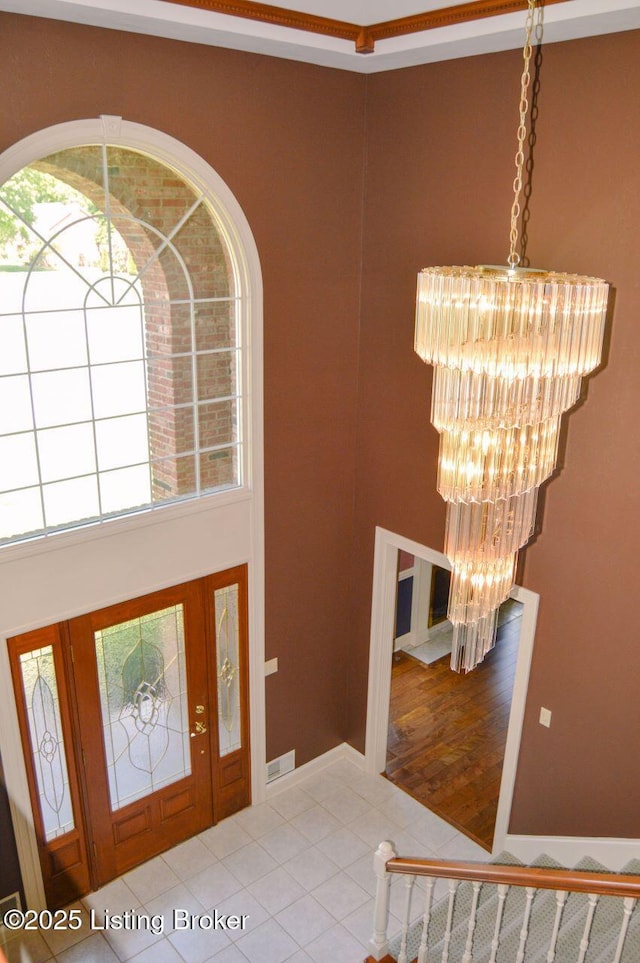 166 Castleton Dr, Bardstown, KY 40004 - entryway with a chandelier, tile patterned flooring, and a towering ceiling