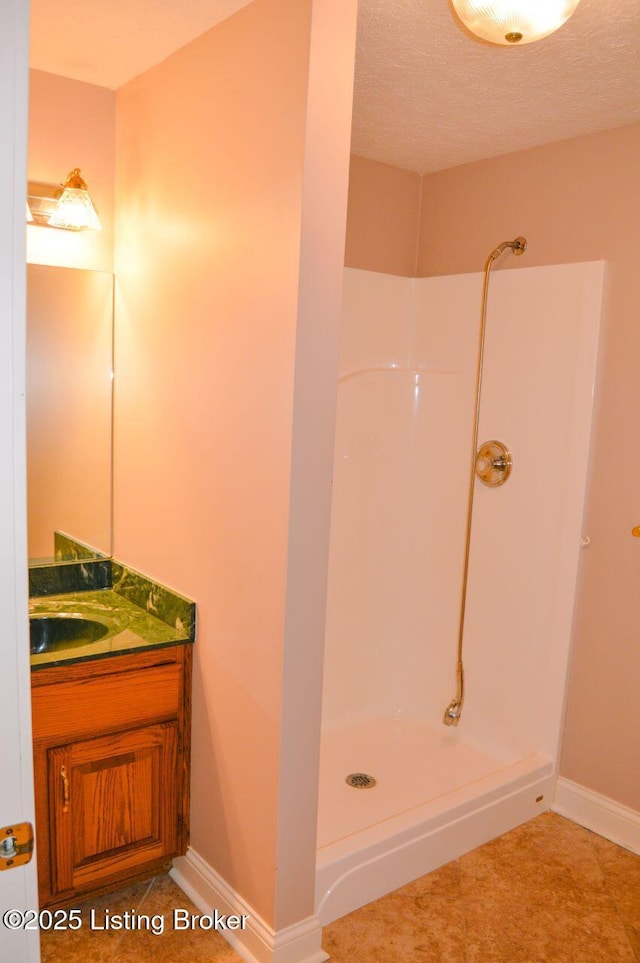 166 Castleton Dr, Bardstown, KY 40004 - bathroom with walk in shower, vanity, and baseboards