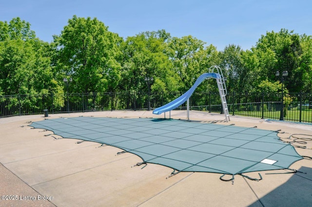 166 Castleton Dr, Bardstown, KY 40004 - view of swimming pool with a water slide and view of wooded area