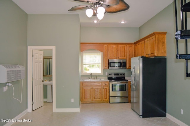 166 Castleton Dr, Bardstown, KY 40004 - kitchen featuring stainless steel appliances, a ceiling fan, a sink, light countertops, and a wall mounted AC